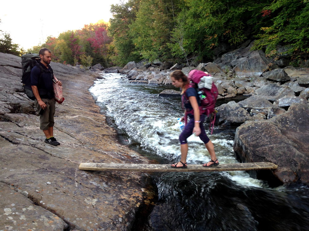 Alicia crossing the plank (Category:  Rock Climbing)