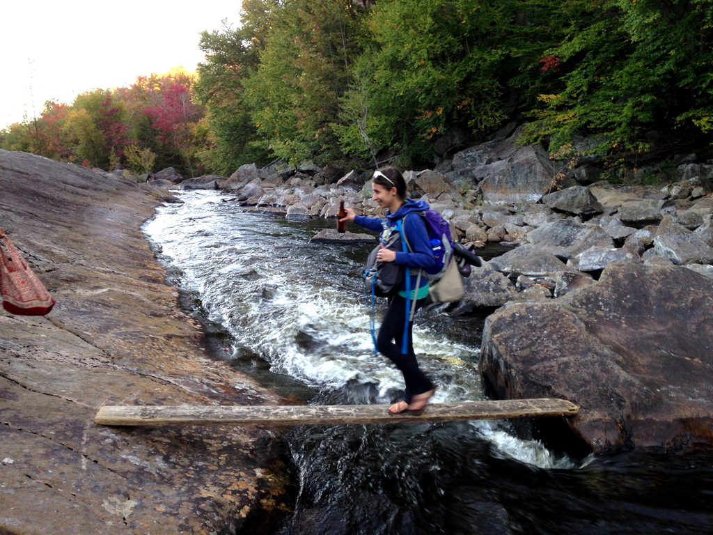 Paula crossing the plank (Category:  Rock Climbing)