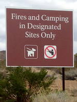 Does anyone shoot dogs in the park? Why do they need a sign for that? (Category:  Rock Climbing)