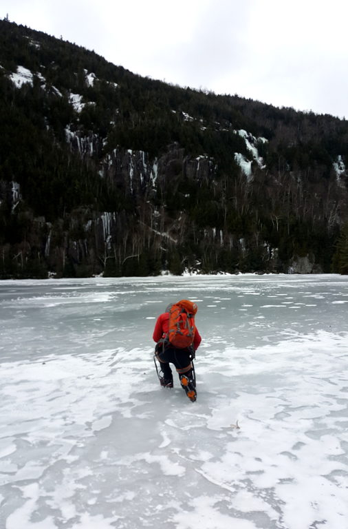 Checking ice thickness (Category:  Ice Climbing)