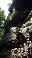 Tara leading King Ducky behind a waterfall (Category:  Rock Climbing)