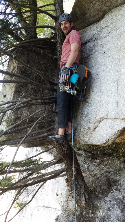 Guy leading the tree at the start of the Sail Flake pitch (Category:  Rock Climbing)