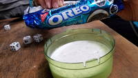 Oreos and powdered milk! And Farkle! Great way to spend a rainy day. (Category:  Backpacking)