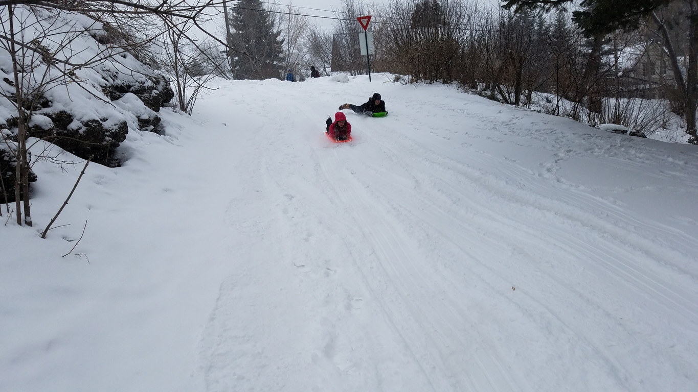 Jackie racing a local for pink slips (Category:  Ice Climbing, Skiing)