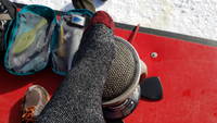 Warming my feet over the propane heater (Category:  Ice Climbing, Skiing)