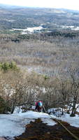 Waterfall Wall, toping out the last pitch (Category:  Ice Climbing)