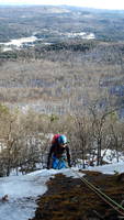 Waterfall Wall, toping out the last pitch (Category:  Ice Climbing)