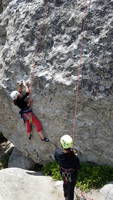 Emily on the boulder problem start to Tres Amigos (Category:  Climbing)