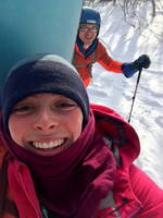 Jackie smiling. Probably because her face froze that way, not because she was having fun. (Category:  Ice Climbing, Skiing)