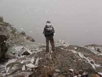 Ryan in the blizzard at the base of Petit Grepon. (Category:  Photography)