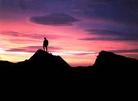 Tom silhouetted against the sunset. (Category:  Photography)