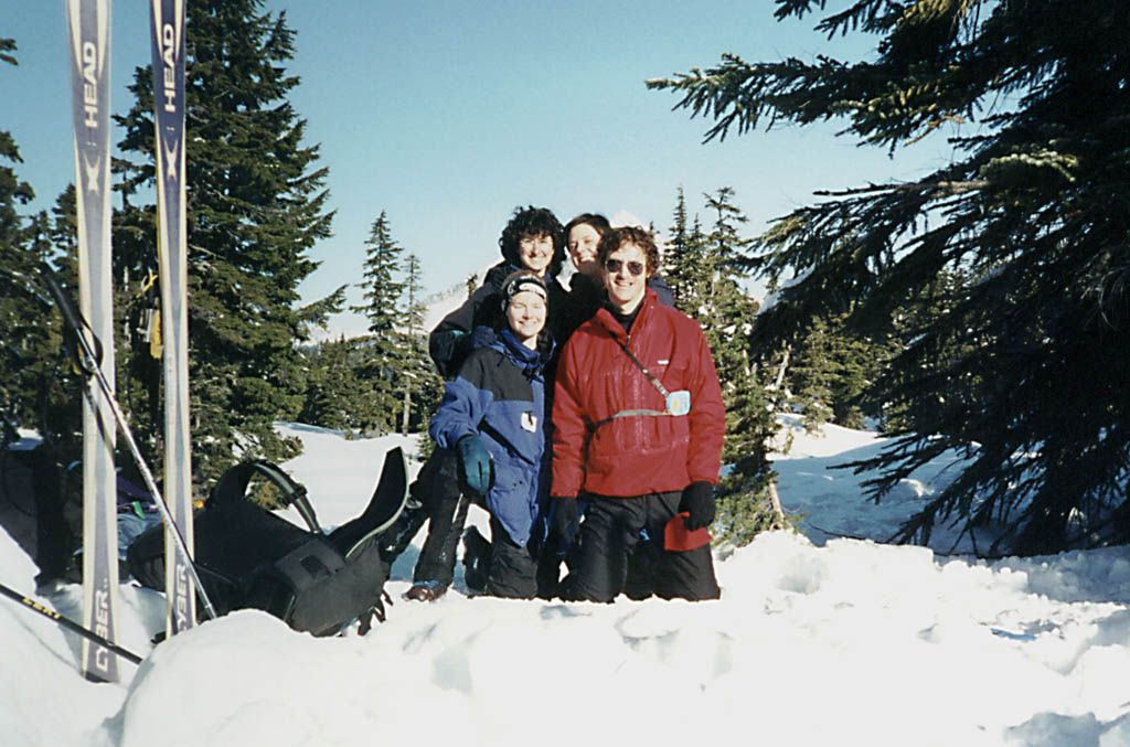 Joanna, Marci, Ann and me posing for the camera. (Category:  Skiing)