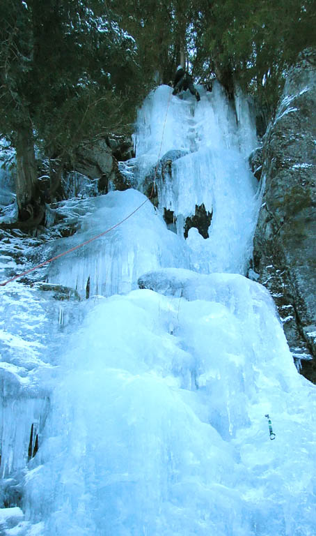 Rayko stemming wide at the top of Ice Slot. (Category:  Ice Climbing)