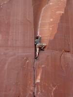 Guy leading some 5.9 climb. (Category:  Rock Climbing)
