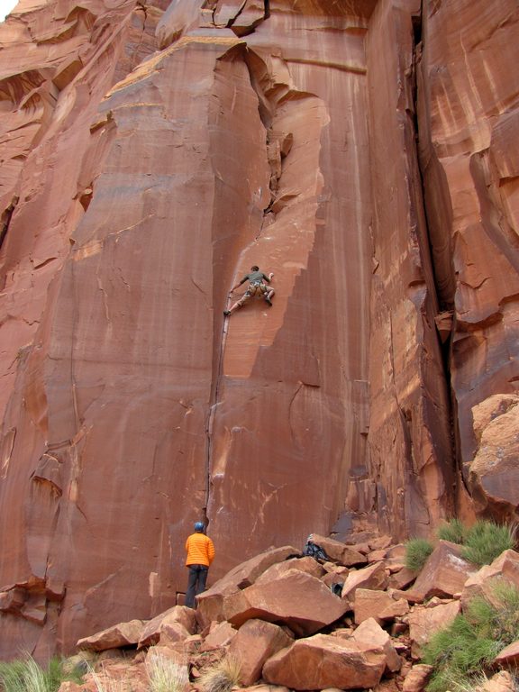 Guy leading some 5.9 climb. (Category:  Rock Climbing)