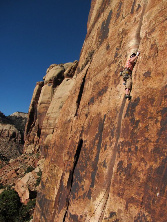 Guy leading Generic Crack. (Category:  Rock Climbing)