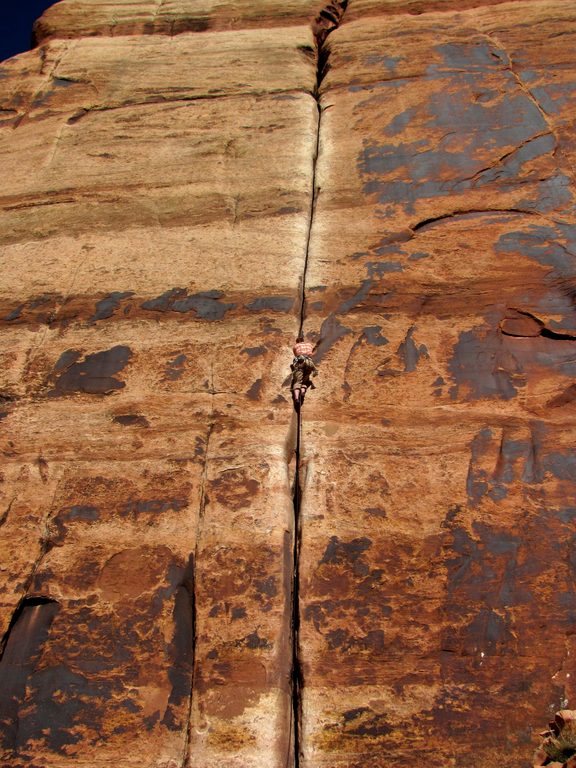 Guy leading Generic Crack. (Category:  Rock Climbing)