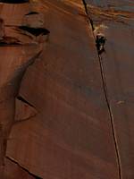 Guy leading Supercrack. (Category:  Rock Climbing)